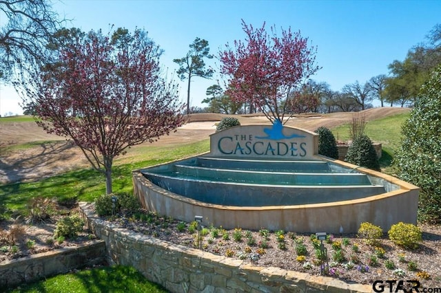 community / neighborhood sign featuring a rural view