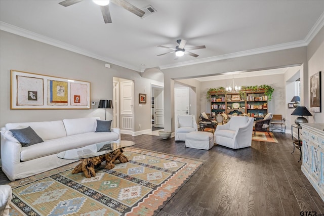 living room with ceiling fan with notable chandelier, dark hardwood / wood-style flooring, and crown molding