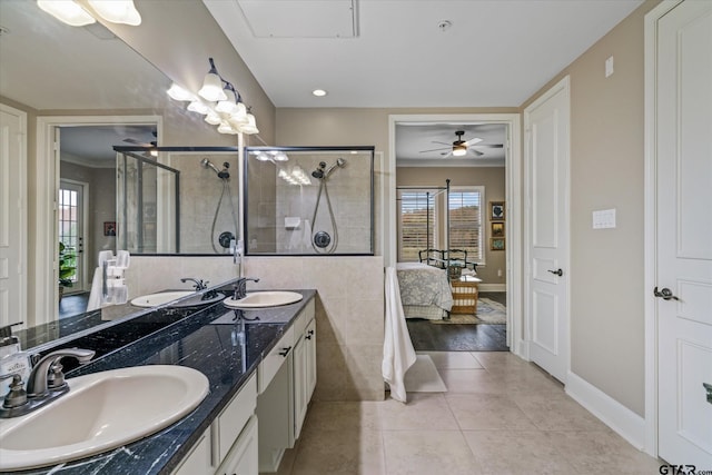 bathroom with vanity, tile patterned floors, ceiling fan, ornamental molding, and a shower with shower door