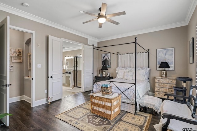 bedroom featuring ceiling fan, ensuite bathroom, dark wood-type flooring, and ornamental molding