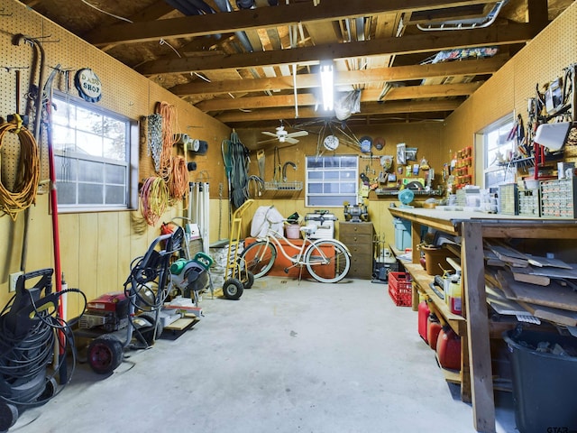 interior space featuring ceiling fan