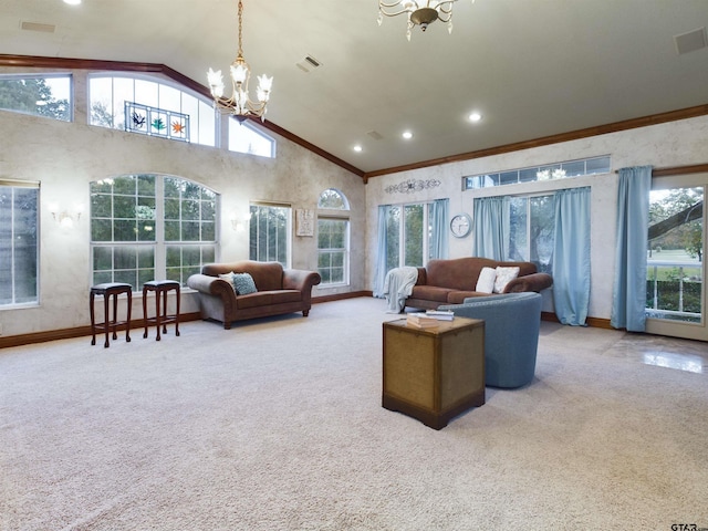 living room featuring carpet flooring, high vaulted ceiling, an inviting chandelier, and ornamental molding