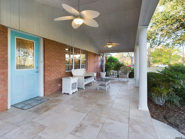 view of patio featuring ceiling fan