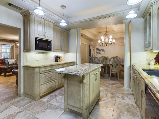 kitchen with a center island, black appliances, a raised ceiling, ornate columns, and a notable chandelier