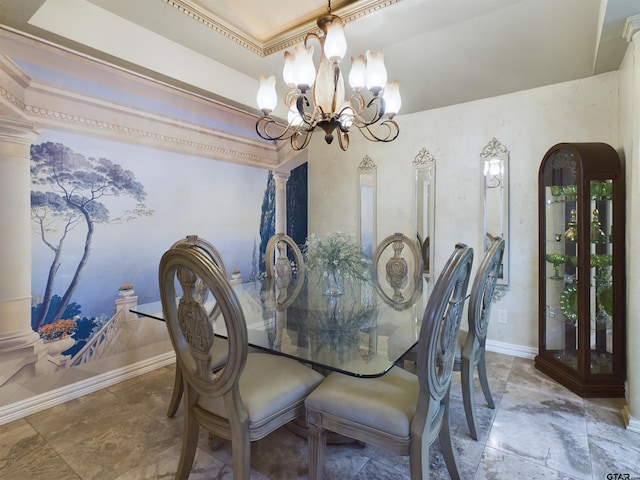 dining space featuring ornamental molding and a chandelier