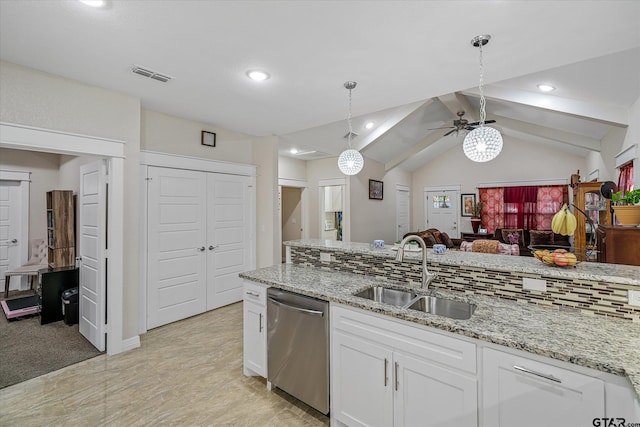 kitchen with lofted ceiling with beams, decorative light fixtures, sink, white cabinets, and dishwasher