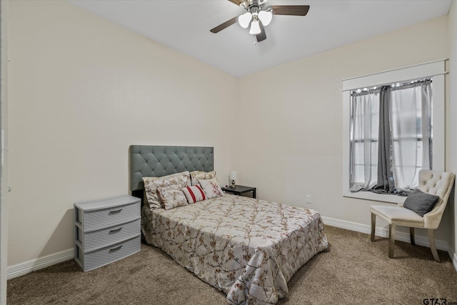 bedroom with ceiling fan and carpet floors