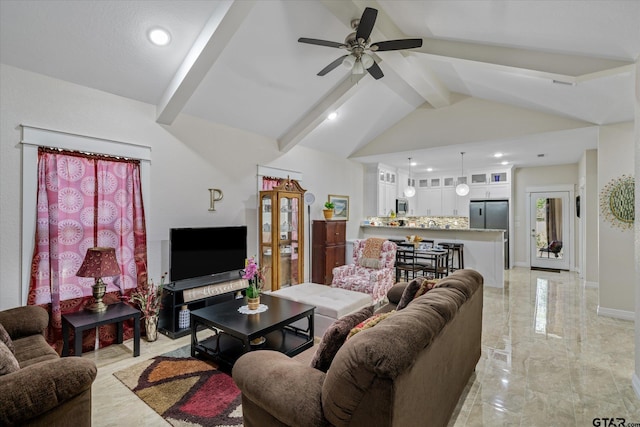 living room featuring ceiling fan and lofted ceiling with beams