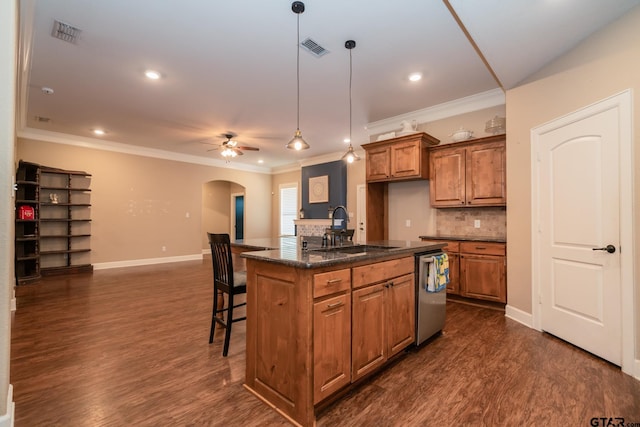 kitchen with arched walkways, visible vents, dishwasher, brown cabinetry, and a sink