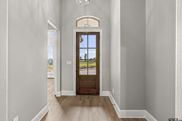 entryway with light hardwood / wood-style flooring