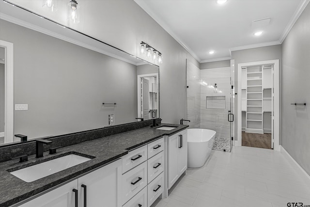 bathroom with separate shower and tub, crown molding, and vanity