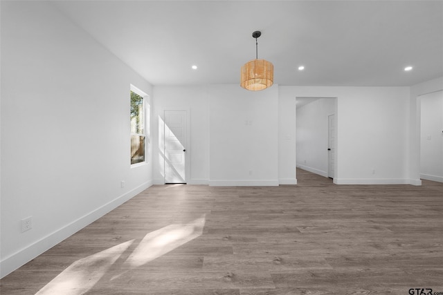 unfurnished living room with light hardwood / wood-style flooring