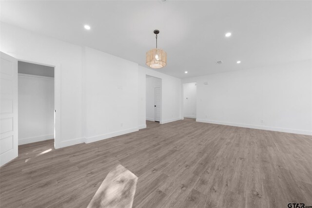 unfurnished living room featuring light hardwood / wood-style flooring