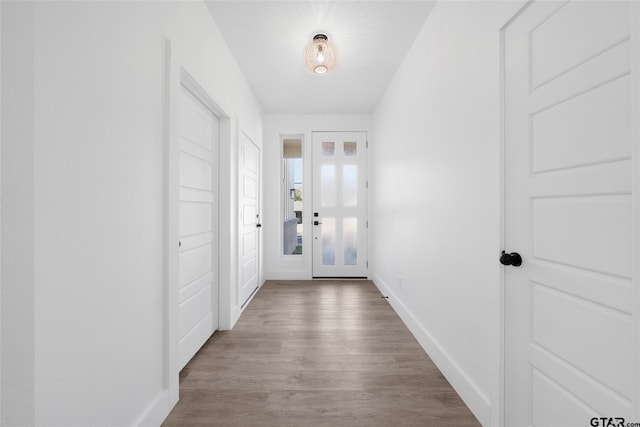 doorway to outside with hardwood / wood-style floors