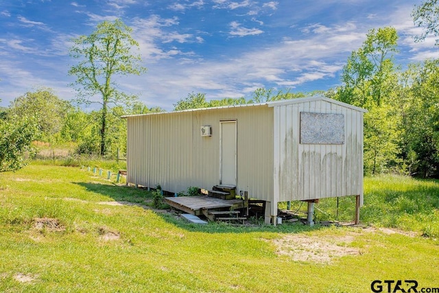 view of outbuilding featuring an outdoor structure