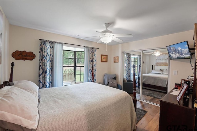 bedroom featuring ceiling fan, a closet, and hardwood / wood-style floors