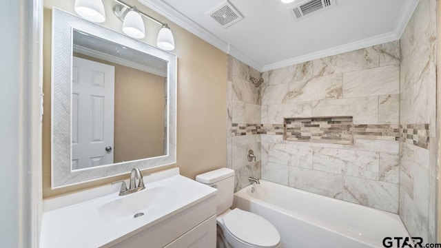 full bathroom featuring toilet, vanity, tiled shower / bath combo, and ornamental molding