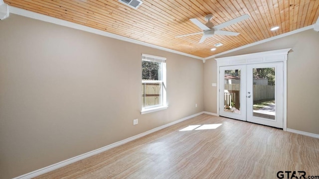 unfurnished room with ceiling fan, french doors, wooden ceiling, crown molding, and vaulted ceiling