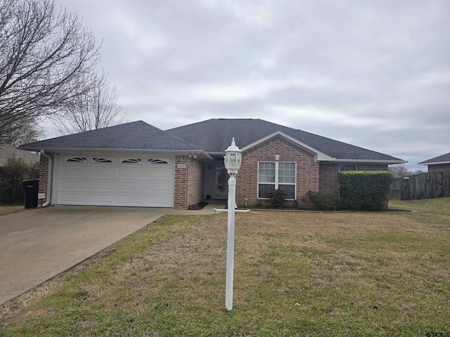 ranch-style home featuring driveway, a garage, fence, a front lawn, and brick siding