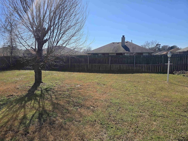 view of yard with fence