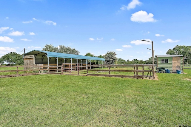 view of stable featuring a rural view