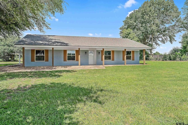 ranch-style house with a front yard