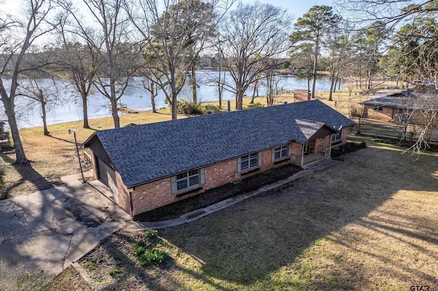 exterior space featuring a water view