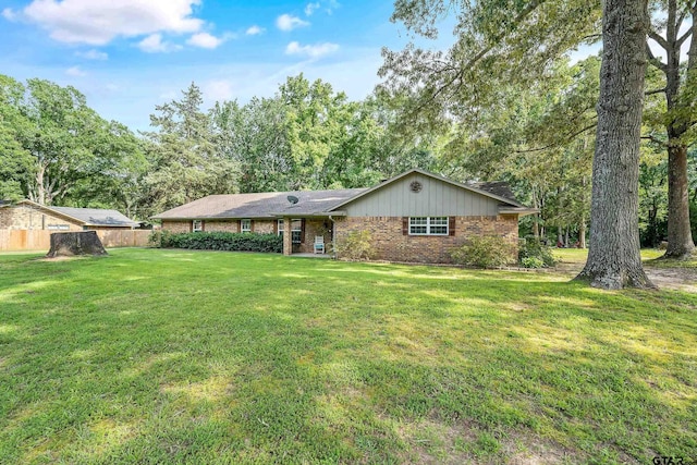 view of front of home with a front yard