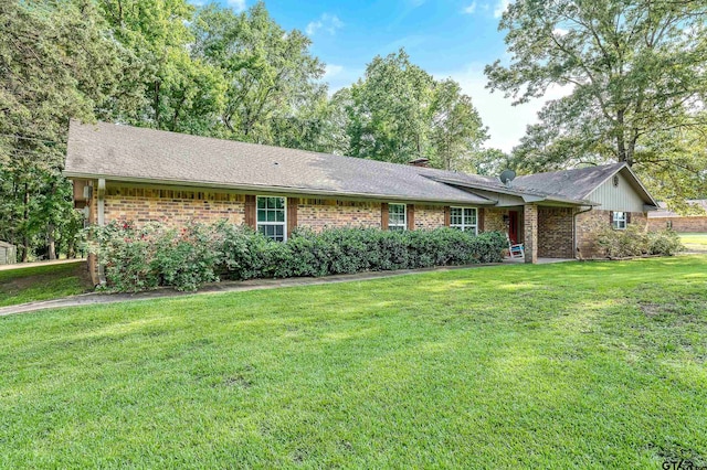 ranch-style house with a front lawn