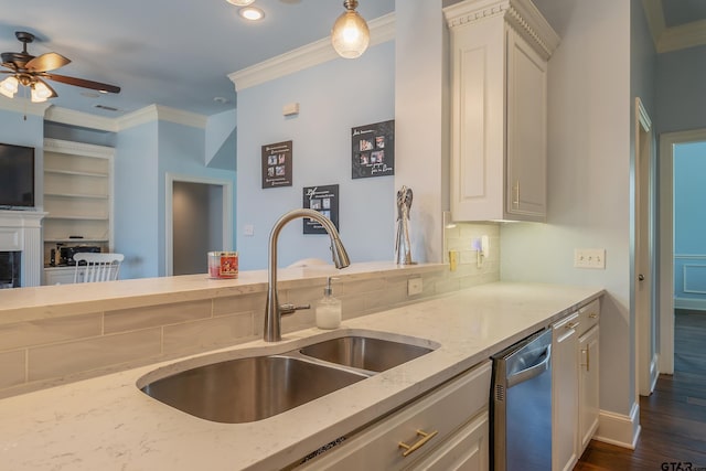 kitchen with white cabinetry and light stone countertops