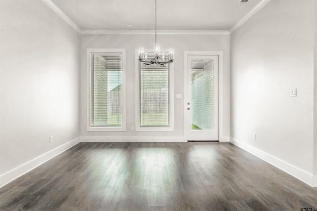 7013 Hillside Ave, Tyler, TX 75707 - unfurnished dining area with a chandelier, ornamental molding, dark wood finished floors, and baseboards