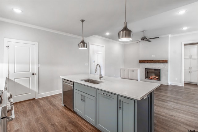 7013 Hillside Ave, Tyler, TX 75707 - kitchen featuring stainless steel dishwasher, gray cabinetry, a sink, a ceiling fan, and ornamental molding