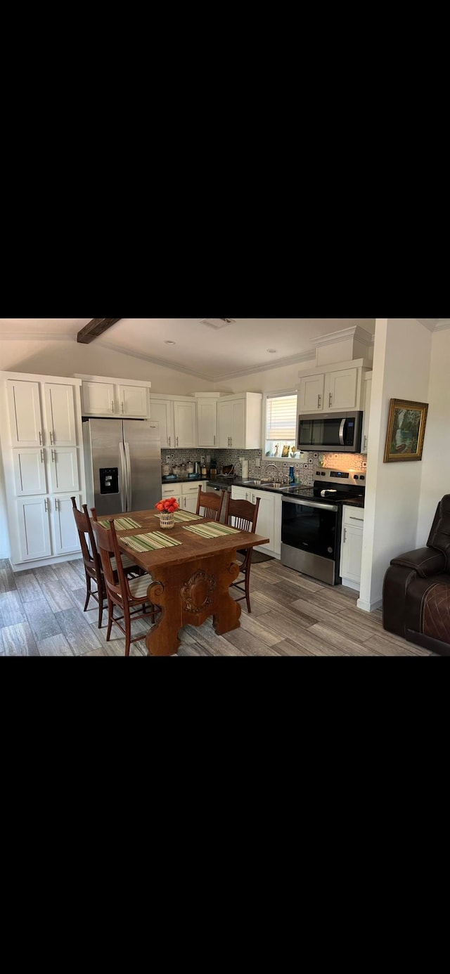 dining area featuring light hardwood / wood-style floors