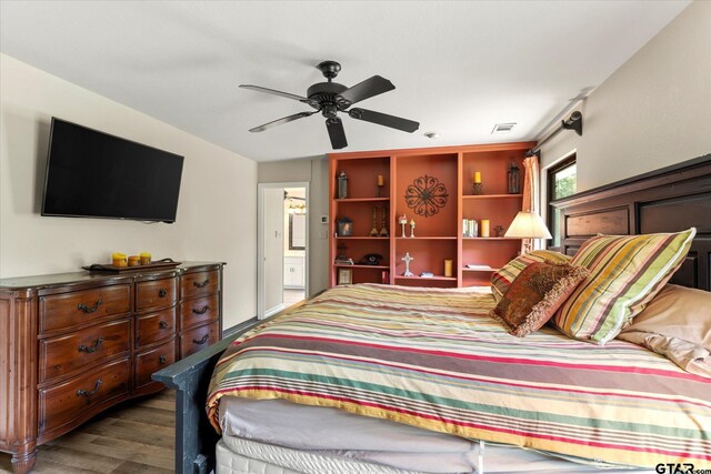 7016 Fm 3054, Malakoff, TX 75148 - bedroom with dark wood-style floors and a ceiling fan