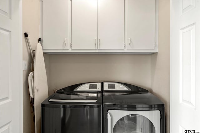 7016 Fm 3054, Malakoff, TX 75148 - laundry room with washer and dryer and cabinet space
