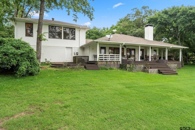 7016 Fm 3054, Malakoff, TX 75148 - rear view of property with ceiling fan, a chimney, a yard, and a wooden deck