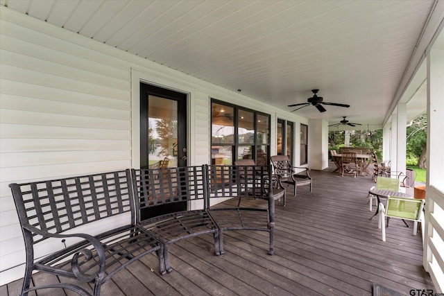 7016 Fm 3054, Malakoff, TX 75148 - wooden deck featuring outdoor dining area and a ceiling fan