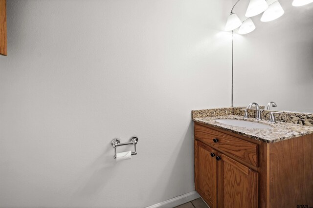 bathroom featuring tile patterned floors and vanity