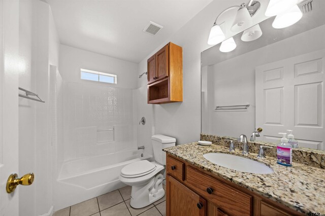 full bathroom with tile patterned flooring, vanity, washtub / shower combination, and toilet