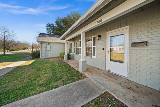 exterior space featuring a yard