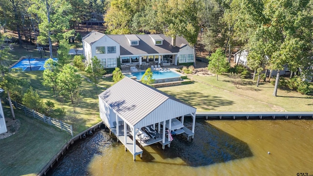 drone / aerial view featuring a water view