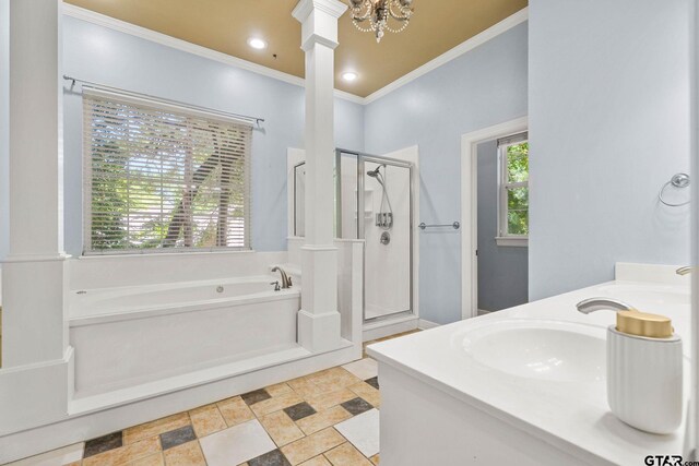 3631 River Oaks Ct, Tyler, TX 75707 - bathroom featuring a shower stall, a garden tub, crown molding, decorative columns, and double vanity