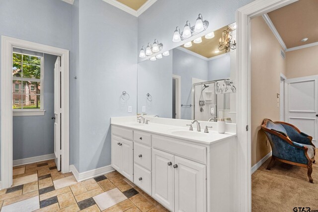 3631 River Oaks Ct, Tyler, TX 75707 - full bath featuring double vanity, crown molding, a shower stall, baseboards, and stone finish floors