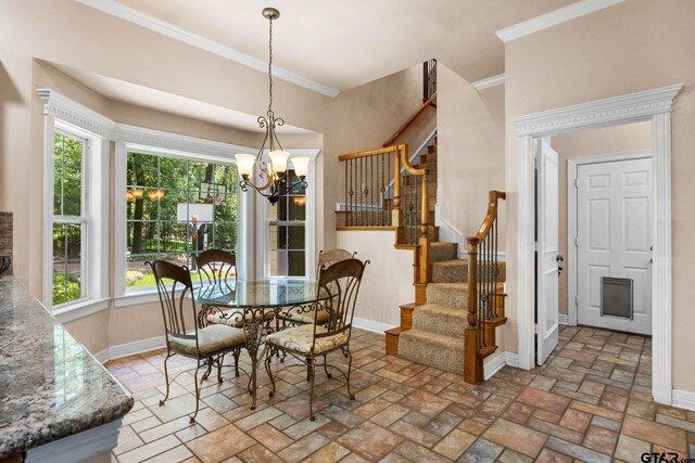 3631 River Oaks Ct, Tyler, TX 75707 - dining area with stairs, ornamental molding, baseboards, a chandelier, and brick patterned floors