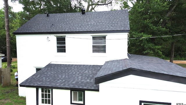 301 Harold St, Crockett, TX 75835 - view of side of property with a shingled roof