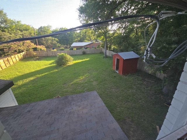 301 Harold St, Crockett, TX 75835 - fenced backyard featuring a patio and a shed