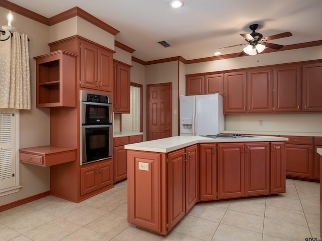 kitchen with white appliances, a center island, ceiling fan, ornamental molding, and light tile patterned flooring