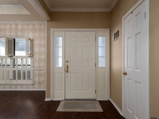 entrance foyer featuring ornamental molding and dark wood-type flooring