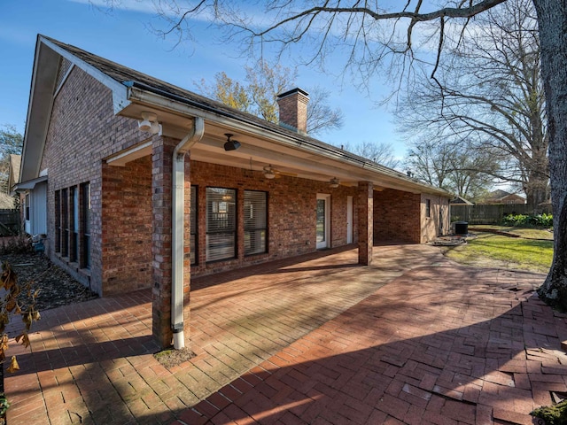 view of home's exterior with a patio area