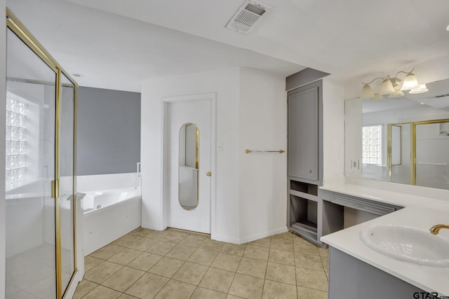 full bath featuring tile patterned flooring, visible vents, a garden tub, a stall shower, and vanity